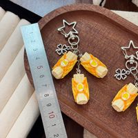 Pendentif segment de banane de simulation, porte-clés étoile pour sac, pendentif pour sac à main, jouet comestible créatif, support de bijoux, vente en gros