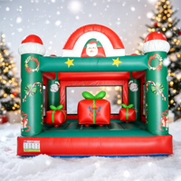 Château gonflable commercial de Noël avec toboggan pour enfants, idéal pour les fêtes de Noël et les attractions commerciales