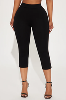 Pantalon Capri pour femme à taille élastique et taille haute, avec détail nœud, couleur unie, coupe évasée, ourlet fendu, coupe ample et respirant