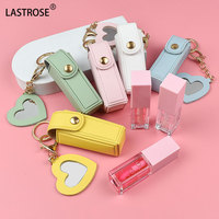 Vente en gros d'étui pour rouge à lèvres en cuir PU avec miroir étui à breloques portable pour femmes porte-clés rouge à lèvres