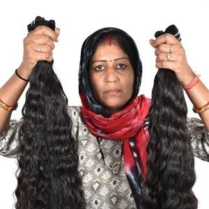 Venta al por mayor 100% Extensiones de cabello humano virgen de templo indio rizado natural sin procesar cutícula alineada proveedor de onda natural - Product Image 1