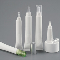 Tube en plastique personnalisé pour crème contour des yeux avec applicateur à bille massant et brosse multifonctionnelle