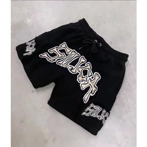 กางเกงขาสั้นชายหาดผ้าคอตตอน100% ผสมสีสำหรับผู้ชายกางเกงขาสั้นสไตล์สตรีทแวร์แห้งเร็วมีโลโก้ตามสั่ง - Product Image 2