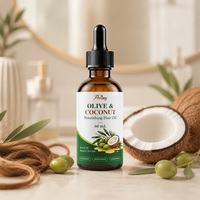 Huile capillaire à l'olive et à la noix de coco, répare les cheveux secs et abîmés, élimine les frisottis et la charge statique, et offre une protection thermique pour tous les types de cheveux, soin quotidien