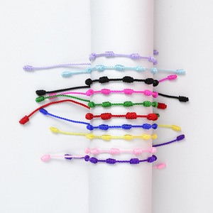 Venta al por mayor buena suerte Hilo Rojo siete cuerda anudada cordón tejido pulsera ajustable hecho a mano trenzado 7 nudos Rosario pulsera amuleto - Product Image 2