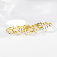 Nouveau design de bagues en cuivre plaqué or en résine transparente bijoux pour femmes bague en graines de moutarde en résine