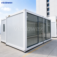 VICDOWEX Bâtiment Contemporain Modulaire en Conteneurs Préfabriqués pour Bureau, Entrepôt à Usage Commercial, Conception Modulaire Résistante aux Tremblements de Terre