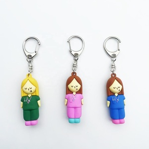 पारदर्शी सफेद ग्लिटर सिलिकॉन pvc रबर कुंजी चेन सिरिंज आकार के एम्बूल कटर नर्सिंग उपकरण - Product Image 1