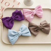 LRTOU Vente en gros de pinces à cheveux pour femmes Accessoires de cheveux de couleur unie nœuds en lin Pince à cheveux papillon floral pour filles