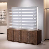 Vitrine d'exposition optique haute capacité en noyer foncé avec étagères LED, vitrine rétroéclairée et armoire de rangement sécurisée