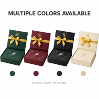 Boîte cadeau cosmétique écologique vert émeraude avec fermeture magnétique, ruban en satin doré et nœud, intérieur en similicuir motif étoilé céleste