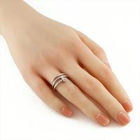 Bague élégante pour ongles, incrustée de strass, plaquée or, style Mobius, pour femmes et hommes, bijoux de mode, vente en gros