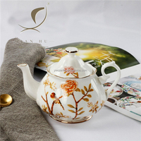 2025 Qian Hu rétro Style européen britannique décalcomanie florale véritable jante en or 570ml céramique os porcelaine théière pour le thé de l'après-midi nouveau