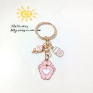 Porte-clés en alliage émaillé avec empreinte <span class=keywords><strong>de</strong></span> pied <span class=keywords><strong>de</strong></span> bébé et biberon, breloque souvenir nouveau-né, cadeau <span class=keywords><strong>de</strong></span> maternité ou <span class=keywords><strong>de</strong></span> baby shower, pendentif pour sac - Product Image 4