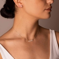 Prix abordable Bijoux en acier inoxydable doré à la mode Collier à breloques en perles de riz véritable 4-5mm