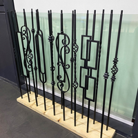 Pièces d'escalier en fer noir satiné pour escaliers intérieurs en colimaçon modernes ronds creux et balustres noirs satinés Style de conception simple