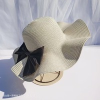 Chapeau de paille d'été Arc pour femmes Écran de mode fait à la main Tricoté Warp Large Brim Wave Beach