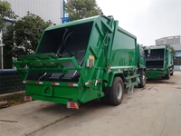 Camion à ordures diesel de marque japonaise 4X2 12-15CBM avec fonction de compression et de transport des déchets