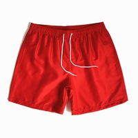 Nouveaux shorts de bain pour hommes en polyester 100% tissé, séchage rapide, couleur unie, style décontracté, pour l'été, vente en gros