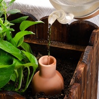 Pot de plante en argile à arrosage automatique en terre cuite avec système d'irrigation à pointes d'arrosage pour plantes de jardin