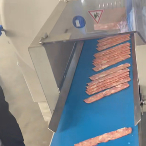 Trancheuse à <span class=keywords><strong>viande</strong></span> industrielle <span class=keywords><strong>de</strong></span> haute précision pour bacon, steak, côtelette <span class=keywords><strong>de</strong></span> porc, machine <span class=keywords><strong>de</strong></span> découpe automatique <span class=keywords><strong>de</strong></span> <span class=keywords><strong>viande</strong></span> congelée avec convoyeur - Product Image 1