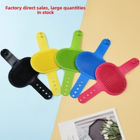 Peigne multifonctionnel en silicone pour animaux de compagnie Brosse de bain pour chien Gants de massage Outil d'épilation des chats Artifact de grattage des jambes de table