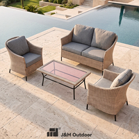 Ensemble de salon de jardin J&M T805 4 places en rotin écologique moderne, canapé deux places en osier, 2 fauteuils, table basse en verre, structure en fer