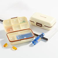 Portable 7 compartiments quotidien pilulier hermétique étanche à l'humidité voyage pilulier poche sac à main conception hebdomadaire médecine stockage