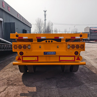 Nouvelle semi-remorque à plateau en acier de 40 pieds, 3/4 essieux, capacité de charge de 50 tonnes, remorque à plateau robuste avec verrous pour conteneurs