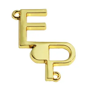 Etiqueta de roupa de letras banhada a ouro personalizada, fabricante de roupas de liga de zinco, furos de costura, logos de natação
