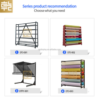Présentoir sur mesure double face pour rouleaux de tissu, tapis, nappes et cuir, avec roulettes