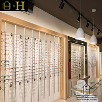 Vitrines optiques personnalisées présentoir optique décoration de magasin de lunettes d'intérieur