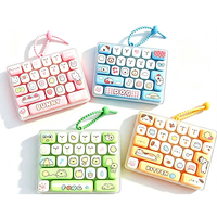 Porte-clés clavier anti-stress transparent 26 touches, style dessin animé, jouet portable pour enfants, pendentif mignon pour sac