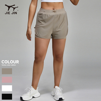 Vente en gros de shorts de gymnastique JIEJIN pour femmes 2 en 1 double pour la course à pied et le fitness avec compression