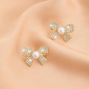 Exquisito lazo nudo Rhinestone perla moda nuevo estilo mujeres dulce temperamento pendientes joyería - Product Image 1
