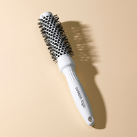 Brosse ronde de beauté à revêtement en céramique ionique de conception personnalisable avec poils et matériau en nylon Emballage personnalisé