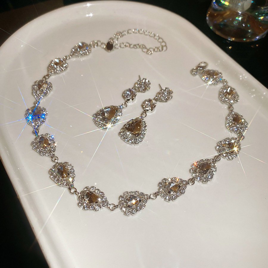 Collier et boucles d'oreilles en forme de goutte d'eau en argent, 102 pièces, accents de diamants
