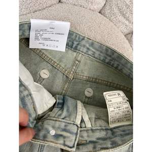 กางเกงขาสั้นผ้ายีนส์ทูพีชเอวสูงแบบไม่สม่ำเสมอตามเทรนด์ล่าสุดสำหรับฤดูร้อน2025 - Product Image 4