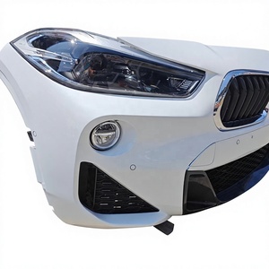 Kit de carrocería de <span class=keywords><strong>segunda</strong></span> <span class=keywords><strong>mano</strong></span> para <span class=keywords><strong>BMW</strong></span> <span class=keywords><strong>X2</strong></span> F39: Parachoques delantero, labio de parachoques, faros y kit de reparación de parachoques. - Product Image 1