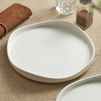 Service de vaisselle en céramique haut de gamme pour hôtels, style occidental, pour pâtes et steaks, assiettes plates peu profondes artistiques en porcelaine fine
