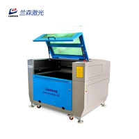 Machine de découpe de gravure Laser CO2 à refroidissement par eau haute sécurité 90W/100W pour bouteille en verre MDF en bois de noix de coco avec plate-forme montante