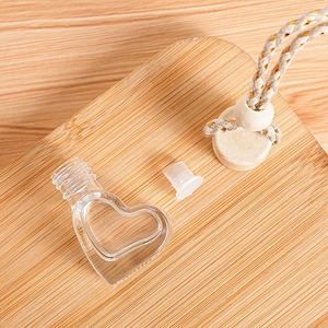 Mini botella de Perfume de vidrio portátil con forma de corazón de 6ml, difusor de Perfume colgante para coche de aromaterapia con tapa difusora de madera - Product Image 3
