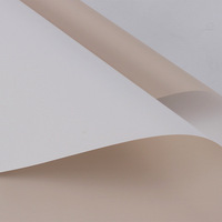 Papier d'emballage de fleurs imperméable personnalisé en usine papier d'emballage de bouquet de papier d'ouya frais de couleur pure cire pour les magasins de fleurs