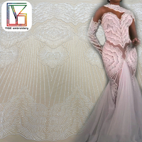 Tissu de dentelle africaine de luxe en tulle brodé de perles blanches et de sequins, lourdement perlé, pour robes de mariée