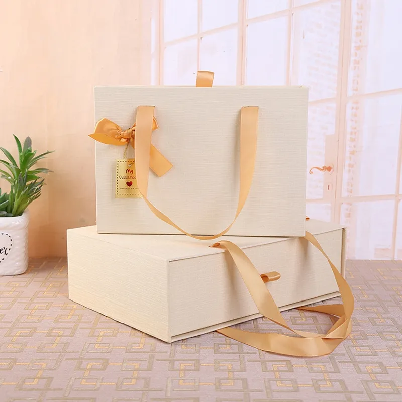 OEM 제조 업체 사용자 정의 디자인 로고 종이 서랍 유형 Bowknot 사각형 핸들 선물 핸드백 포장 상자 세트 선물 상자