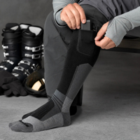 Chaussettes chauffantes électriques en gros et chaussettes électriques pour hommes, chaussettes de ski avec chauffage des orteils et ajustement extensible pour le snowboard