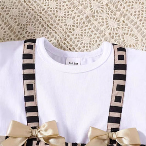 Venta caliente verano bebé falda algodón 0-2 años bebé niña cuello redondo manga con volantes lindo arco costura vestido