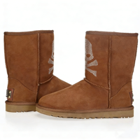 Bottes d'hiver en cuir de vache et peau de mouton, design crâne en cristal, semelle antidérapante, logo et style personnalisés, vente en gros ODM/OEM