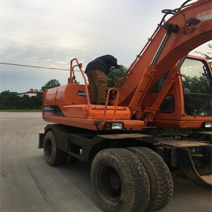 Excavatrice sur pneus d'occasion Doosan DH210 DH130W DH140W-7 DH150 avec une capacité de godet de 0,28 à 0,75 m³ et une puissance de 71 kW à vendre - Product Image 2