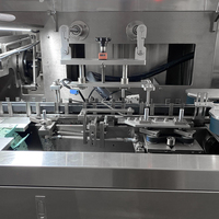 Machine à emballer entièrement automatique de feuille d'étanchéité de préservatif Machine à emballer de boîte de préservatif
